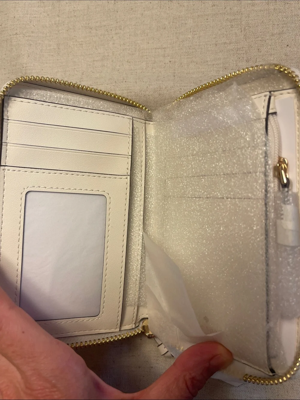 kate spade Straw and Cream Zip-Around Wallet with Gold Logo